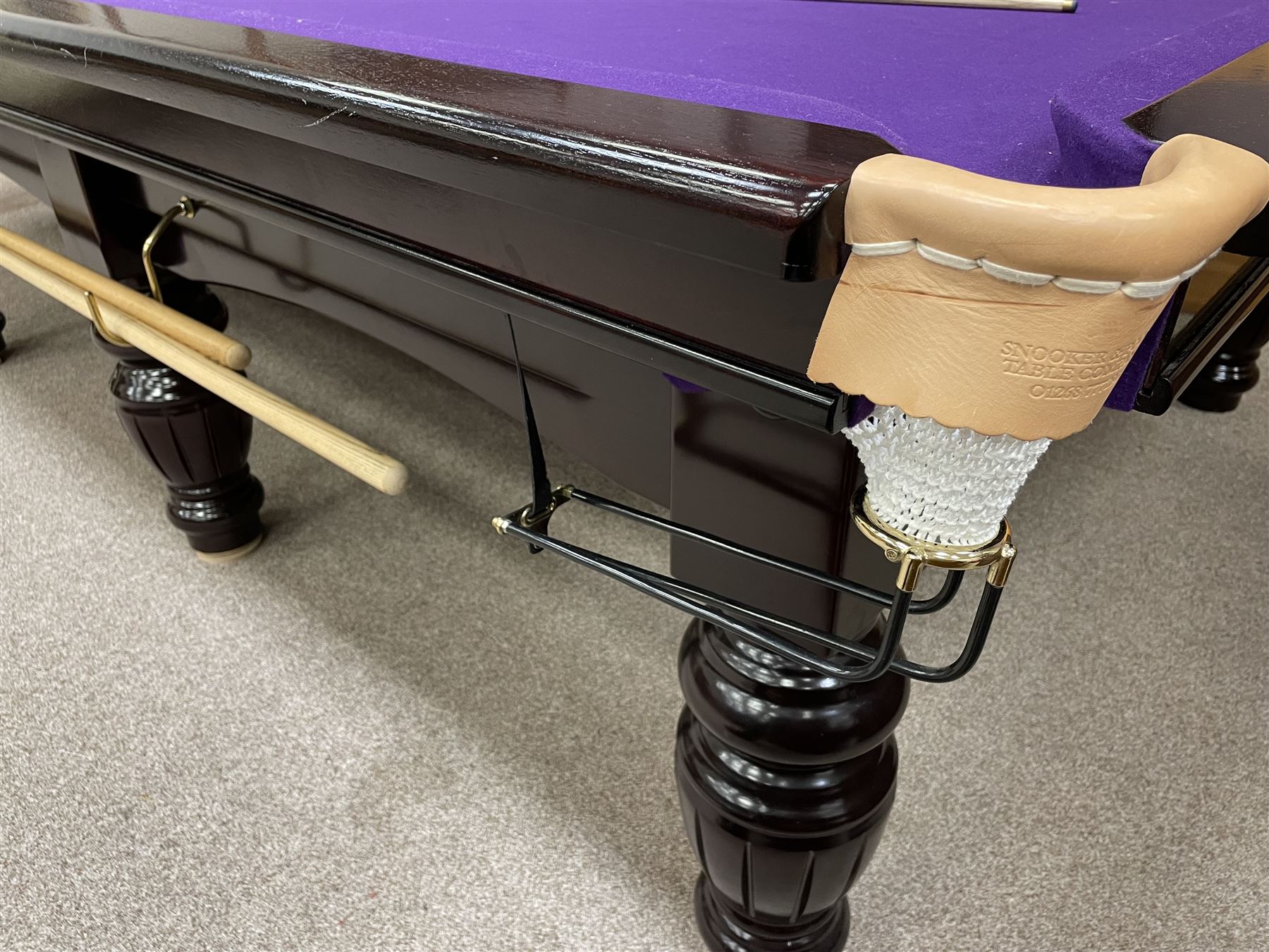 Riley - full-sized 12' x 6' slate bed snooker table, mahogany frame with purple baize, raised on turned and fluted baluster supports, recently refurbished; together with, cues, scoreboard, cover, snooker and pool balls