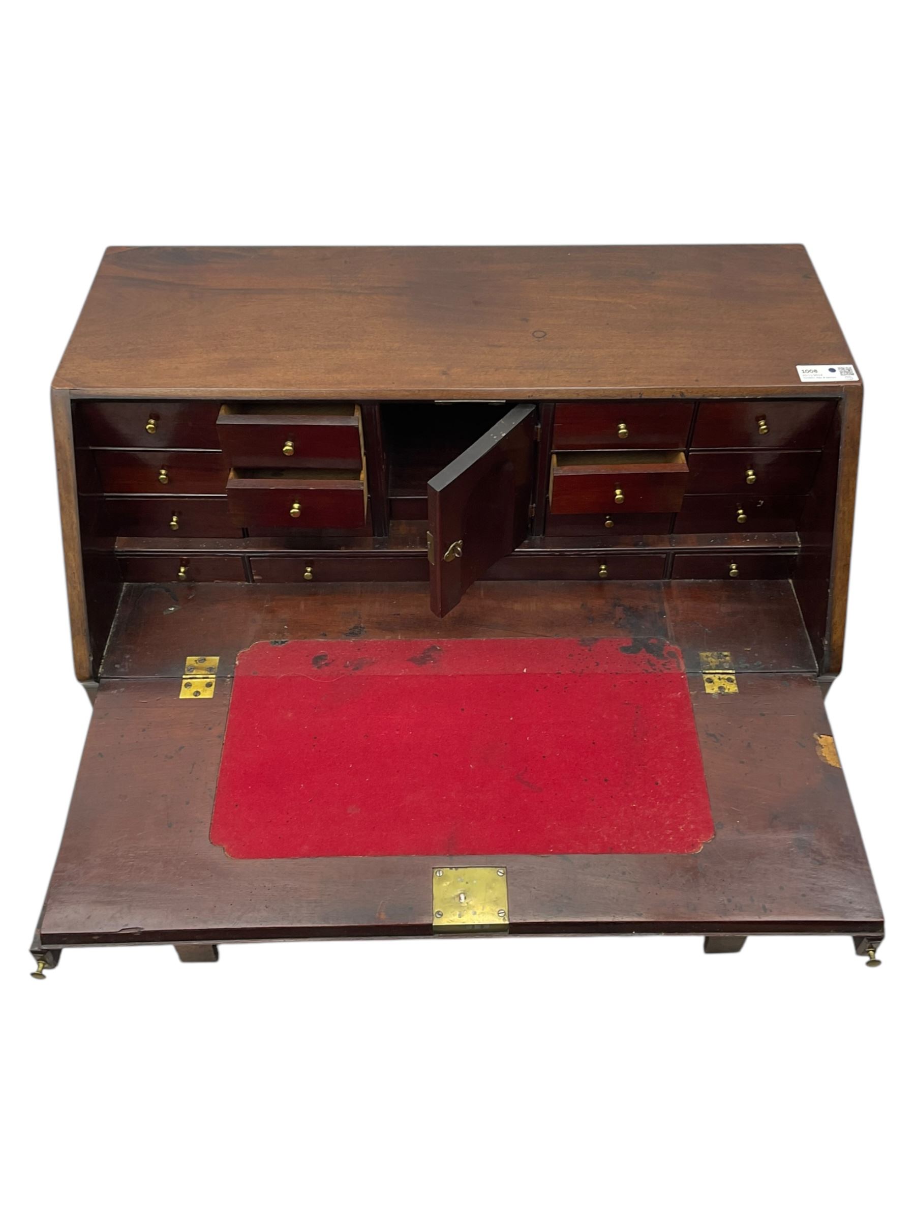 George III mahogany bureau, the fall front enclosing fitted interior, three graduating long drawers, on bracket feet