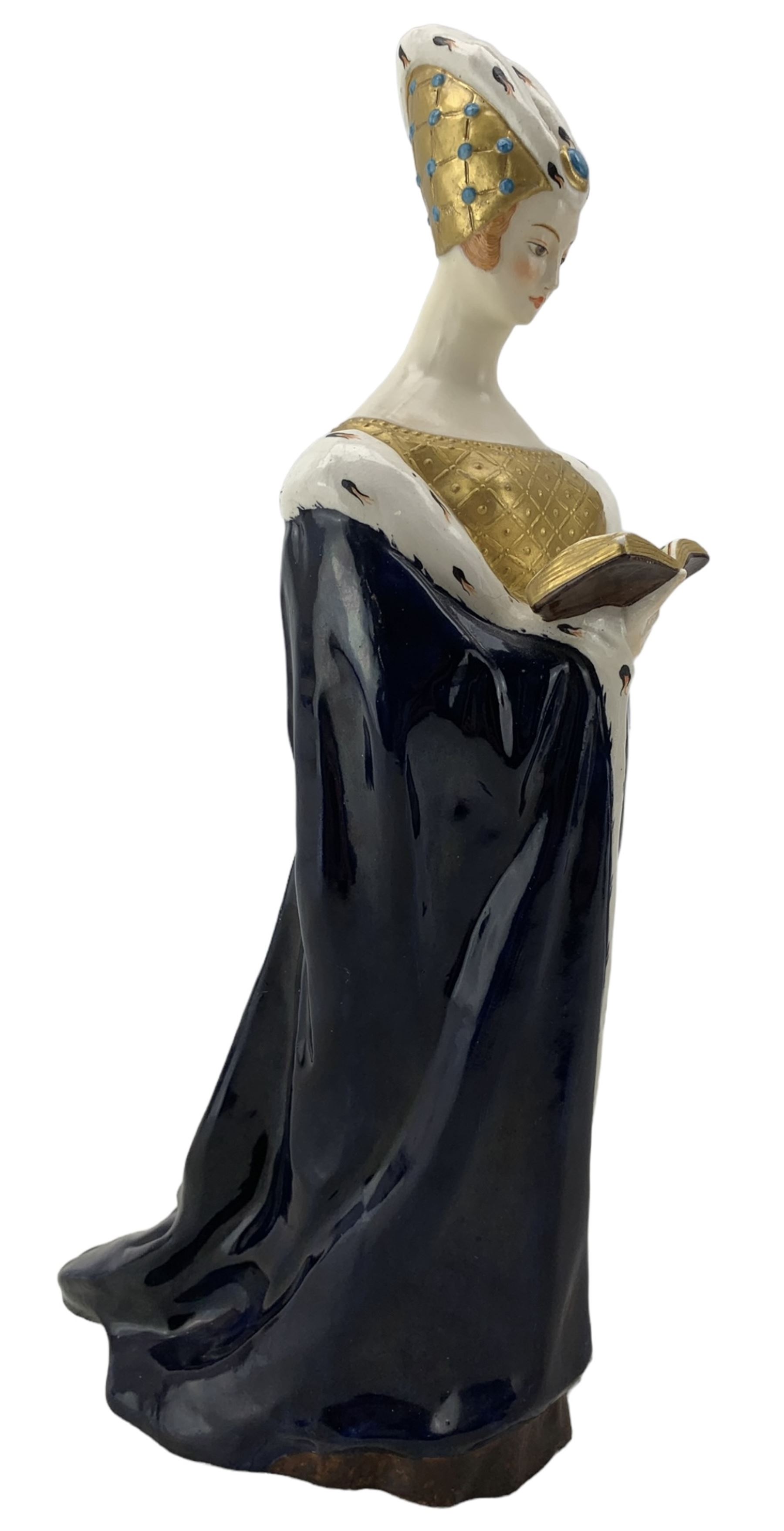 Early to mid 20th century porcelain figure modelled as a Medieval woman, dressed in a blue robe and reading a book, in the style of Dressel & Kister, stamped JV Paris beneath, H31cm 