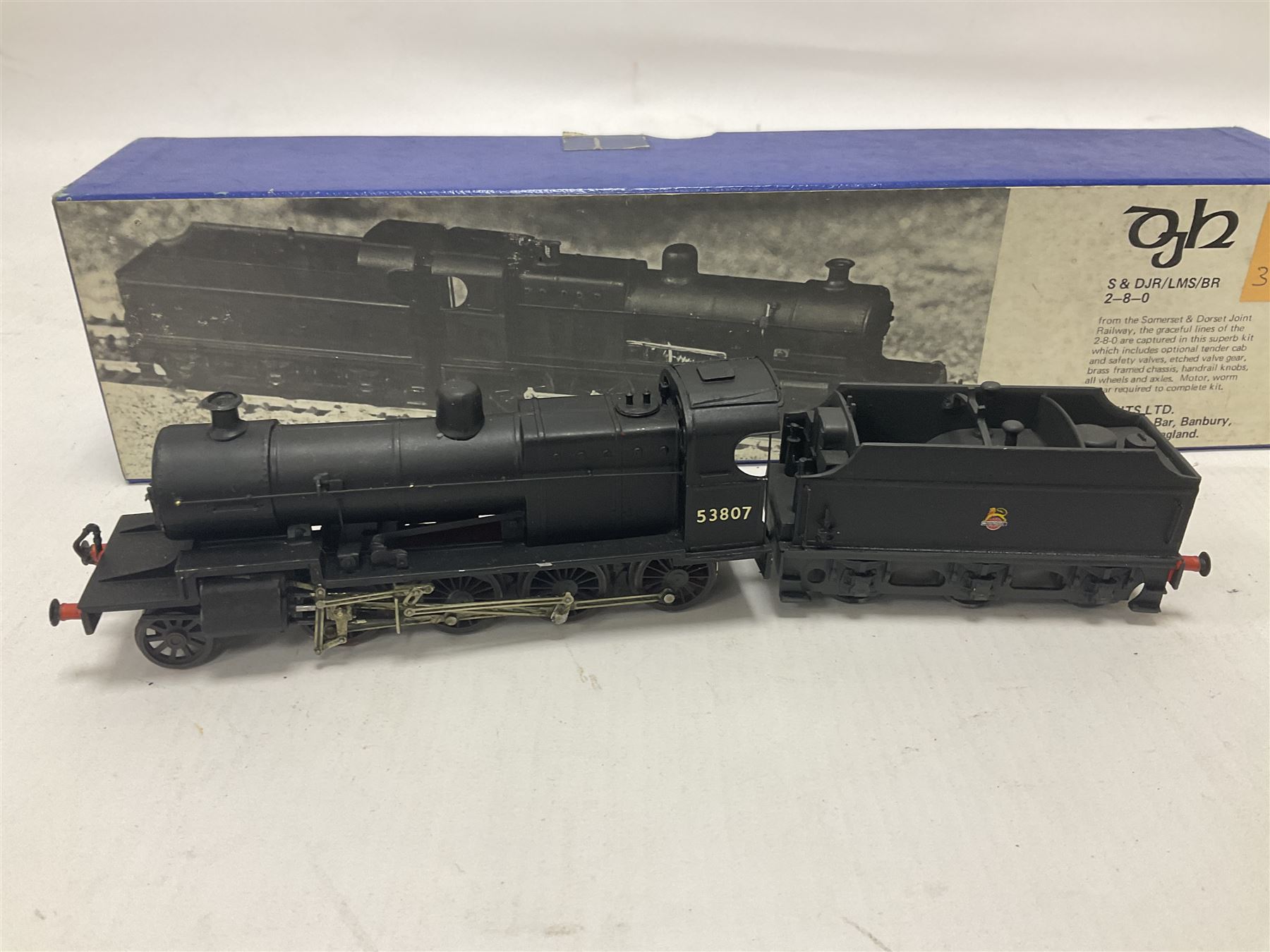 ‘00’ gauge - kit built S&DJR/LMS/BR 2-8-0 no.53807 steam locomotive and tender, finished in BR black with DJH Models box; with further kit built Standard Class 9F 2-10-0 steam locomotive and tender no.92026 finished in BR black (2) 