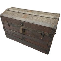 Late 19th to early 20th century leather and wood bound chest with metal fixtures 