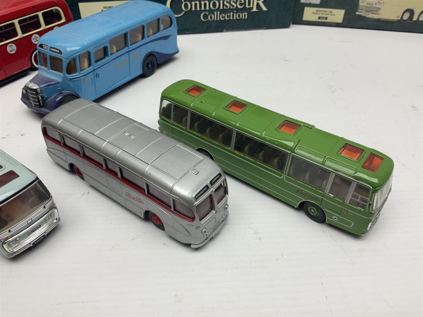 Corgi - twenty-three modern die-cast models of buses and coaches to include 35301, 35303, 35305 and 91916; mostly loose but nine boxed 