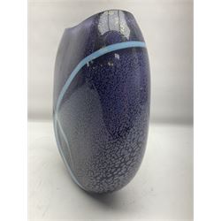 Stuart Akroyd glass vase, with blue ribbon decoration upon a mottled purple ground, engraved signature and sticker beneath, H25.5cm