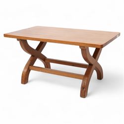 Rabbitman - oak coffee table, rectangular adzed top on curved x-framed supports, carved wi...