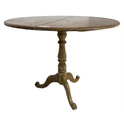 19th century pine dining table, circular moulded top on turned column, three out-splayed supports with scrolled terminals
