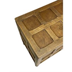 Sid Pollard (ex. Mouseman) - Yorkshire oak blanket chest, all over panelling, enclosed by hinged lid, on octagonal feet, interior plaque inscribed 'S. Pollard, Bagby, Thirsk, Yorks' 