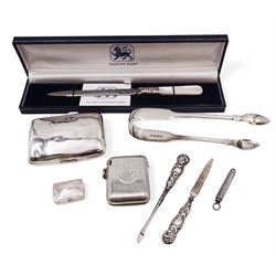 Group of silver, including vesta case, cigarette case, sugar tongs, pill box, letter opener etc, all hallmarked 