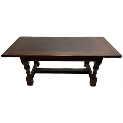 20th century oak refectory dining table, rectangular cleated top on turned supports joined by H-stretcher