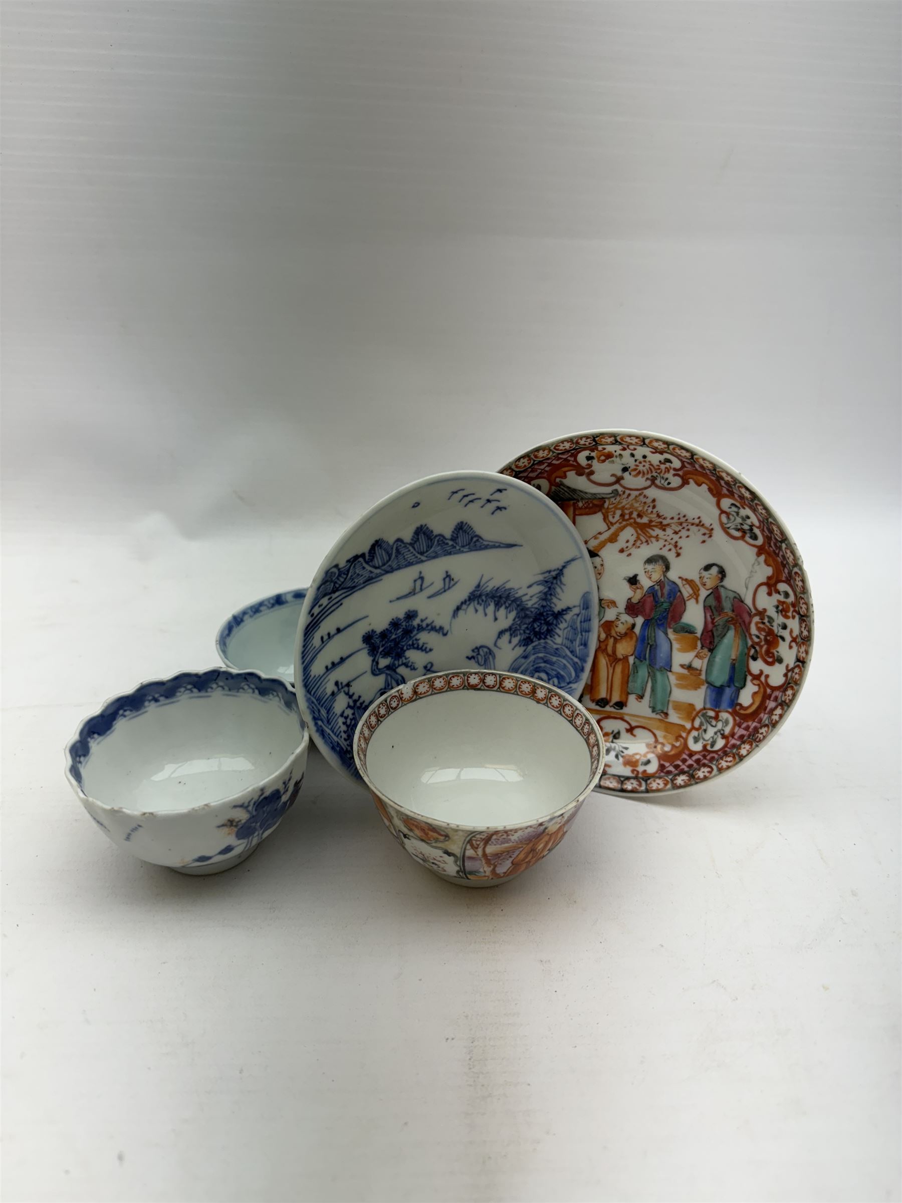 19th Century Chinese tea bowl and saucer, decorated with figures in a garden scene, together with tow other tea bowls and a saucer 