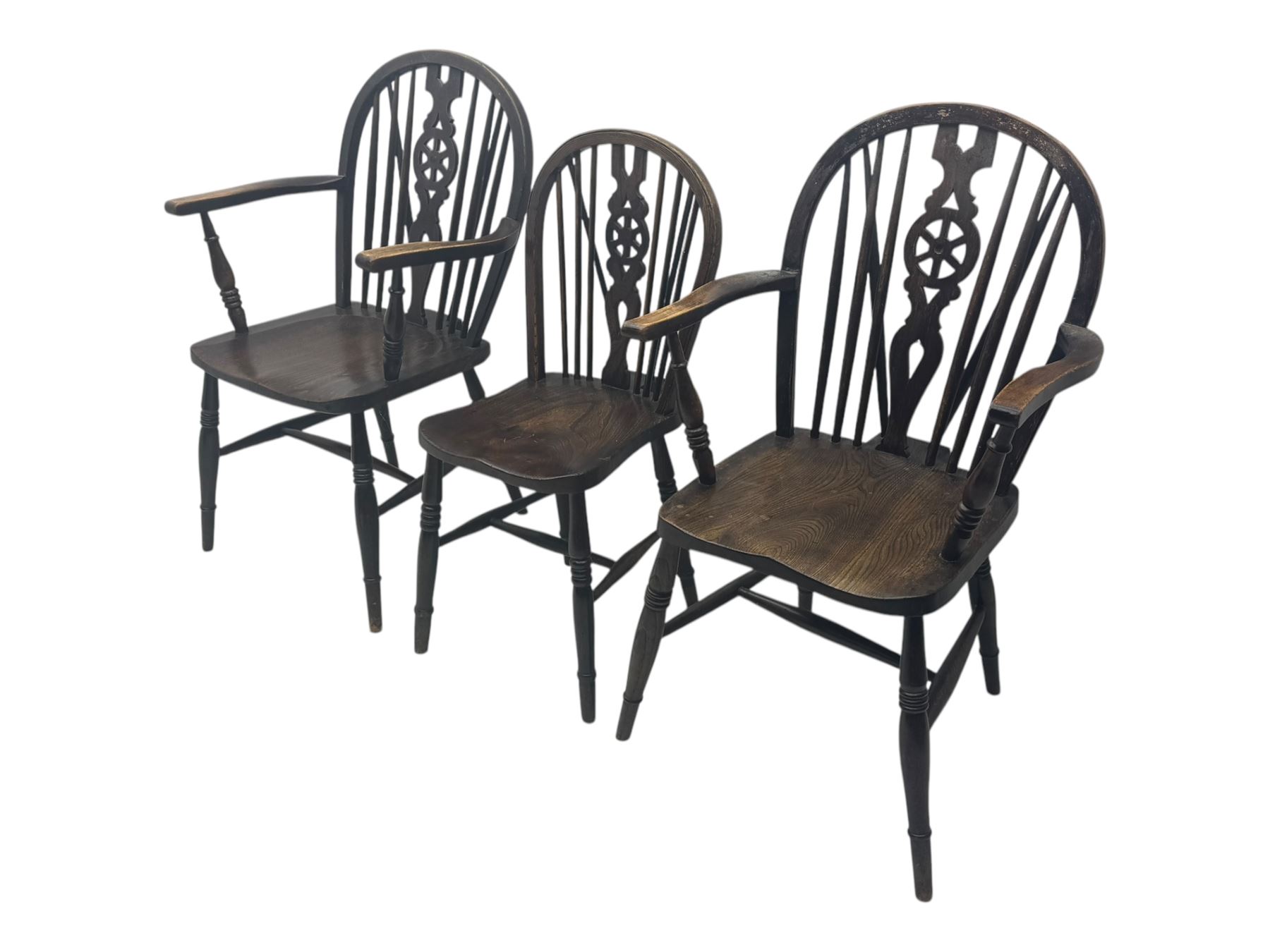 Set of six 19th century elm and ash dining chairs, hoop back with pierced wheel-shaped central splat, shaped saddle seat, raised on turned supports united by H-stretchers