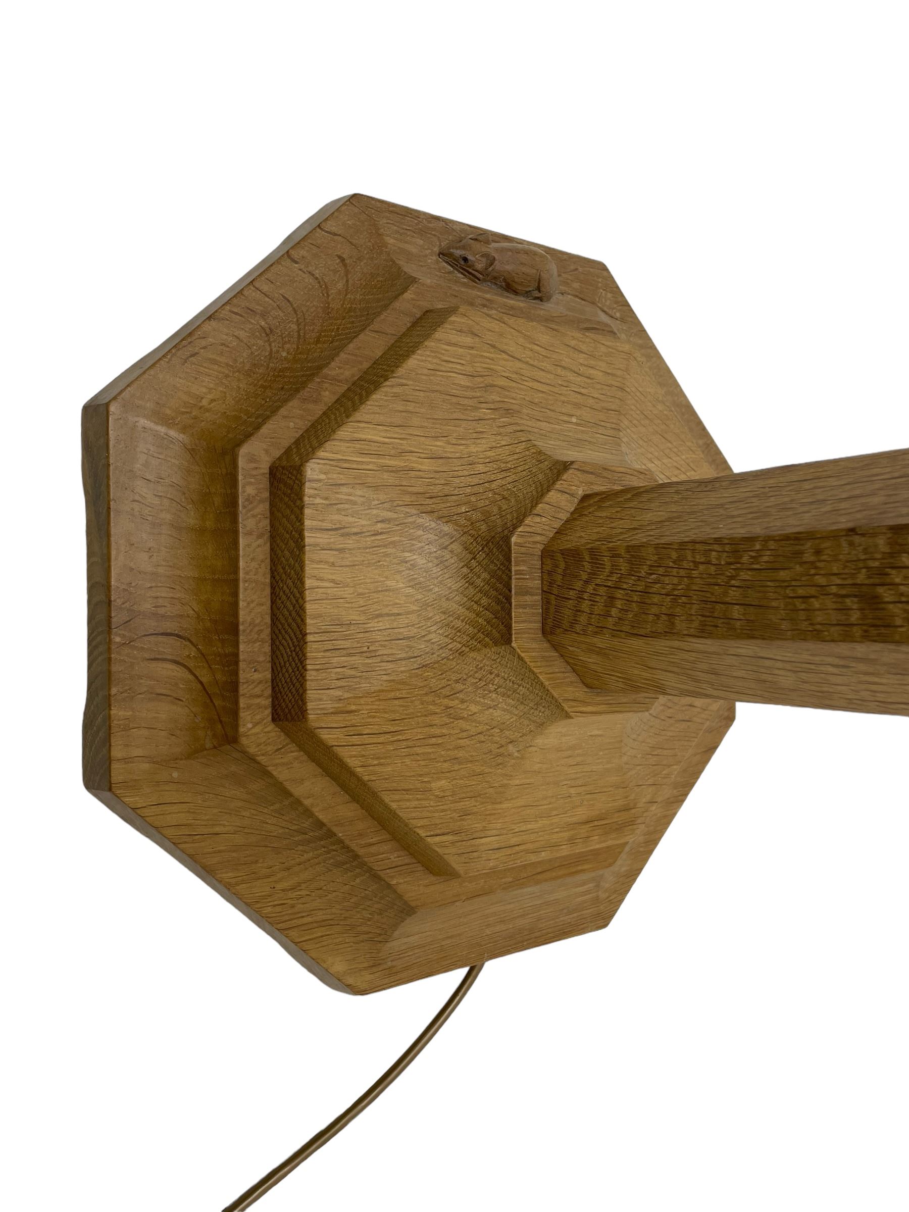 Mouseman - oak standard lamp, octagonal tapered stem on stepped and moulded octagonal base, carved with mouse signature, by the workshop of Robert Thompson, Kilburm 