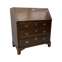 George III mahogany bureau, the fall front enclosing fitted interior, three graduating long drawers, on bracket feet