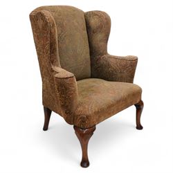 George III oak framed wing-back armchair, the arched cresting rail over deep wingback and ...