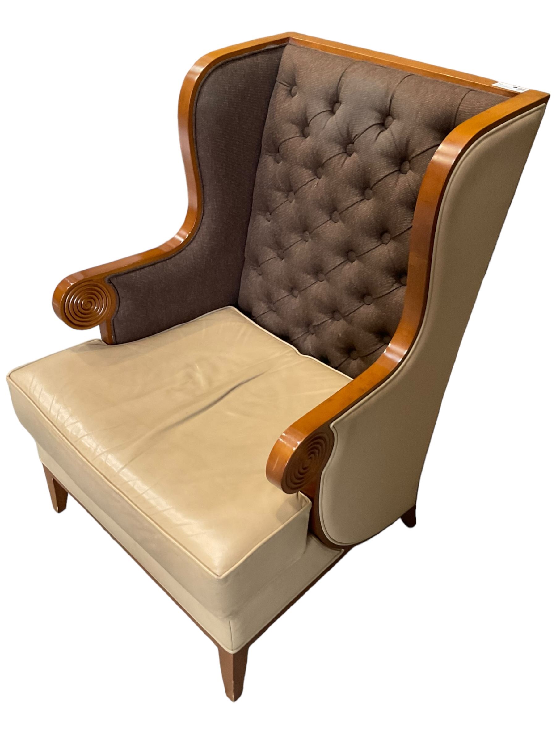 Walnut finish framed wing back armchair upholstered leather and buttoned fabric