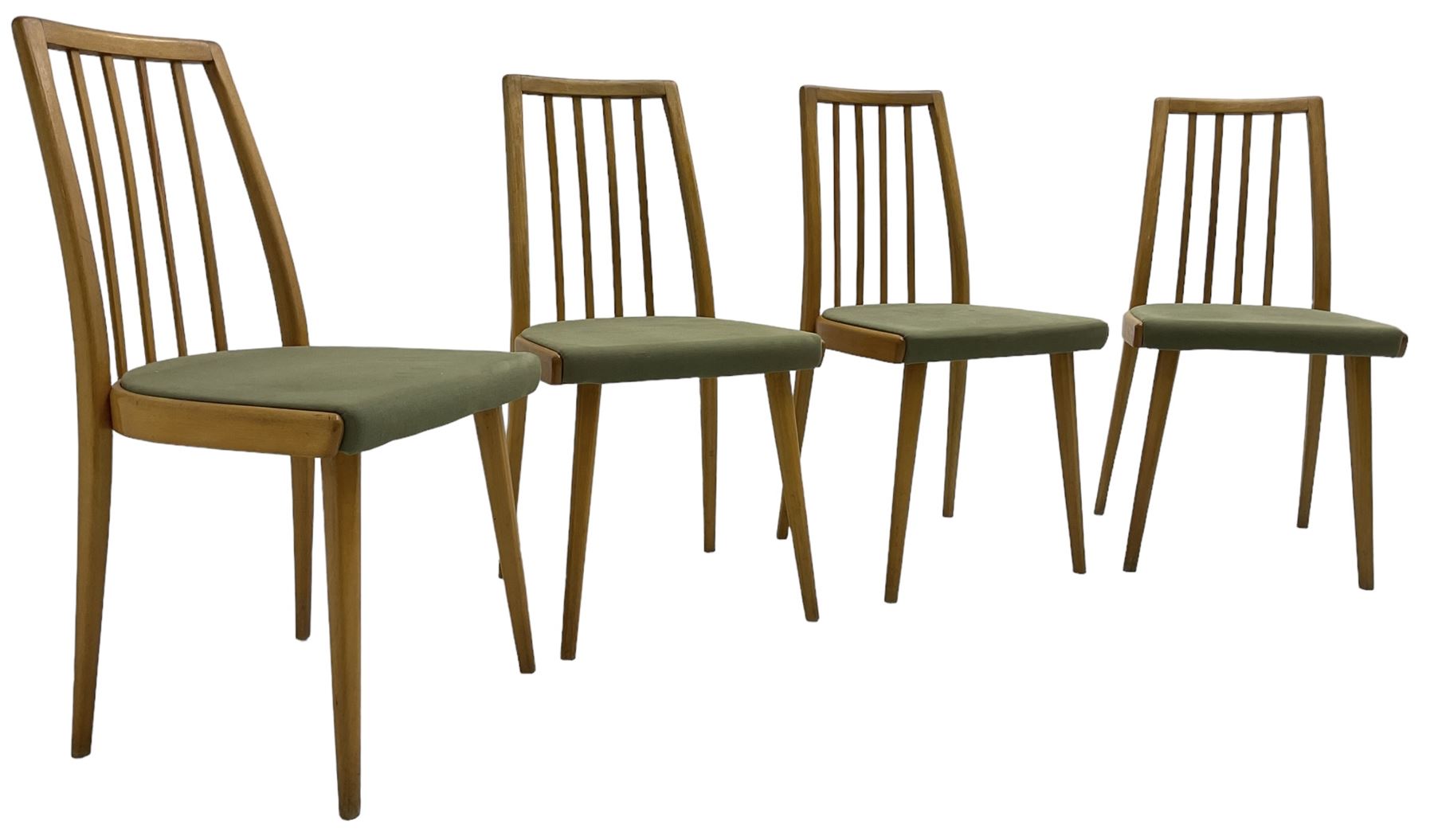 Set of four mid-20th century beech framed dining chairs, vertical slat back over upholstered seats, on tapering supports