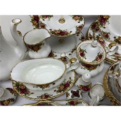 Royal Albert Old Country Roses pattern coffee service for six, comprising coffee pot, milk jug, cups and saucers, cake plate, together with miniature teapot, six teacups and saucers, six dinner plates, six side plates etc 