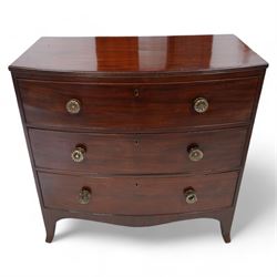 George III mahogany bow-fronted chest, shaped rectangular top with reed edge, fitted with three graduating cock-beaded drawers with brass pull handles, shaped apron over splayed bracket feet