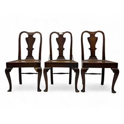 Set of four early 19th century oak chairs, shaped cresting rail over shaped splat, panelle...