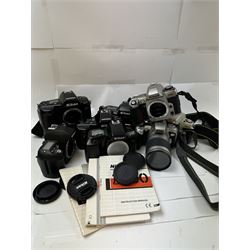 Collection of Nikon cameras, to include F60 serial no. 2574507, boxed, F70 serial no. 2807667, F75 serial no. 2062602, with an AF Nikkor 28-100mm 1:3.5-5.6 G lens serial no. 2166614, two F80 examples serial nos. 2553343 & 2777869, two F90X examples serial nos. 2209737 & 2438888, one boxed and an F100 serial no. 2051550