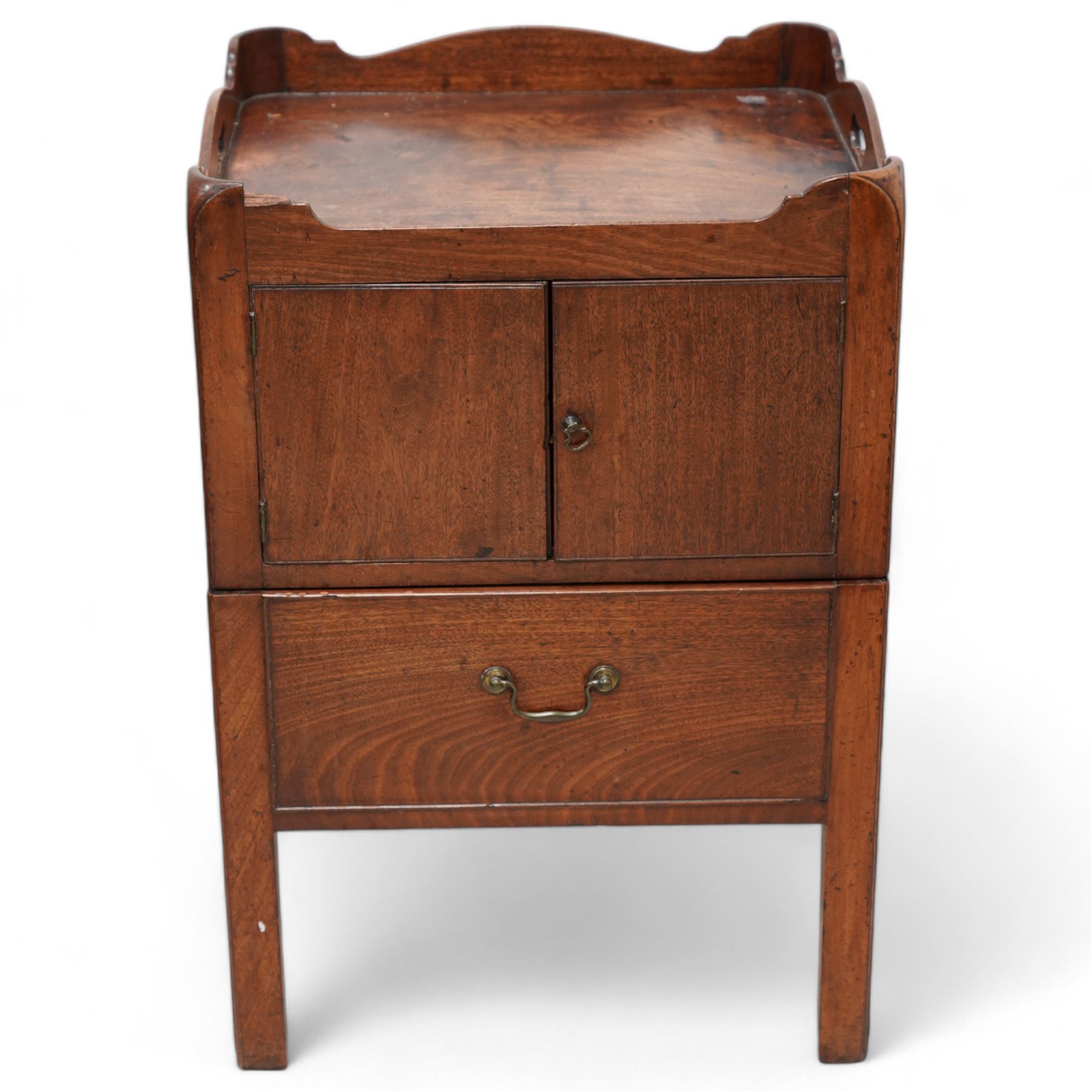 George III mahogany night commode, tray-top with pierced handles, fitted with cupboard over commode drawer, on square moulded supports