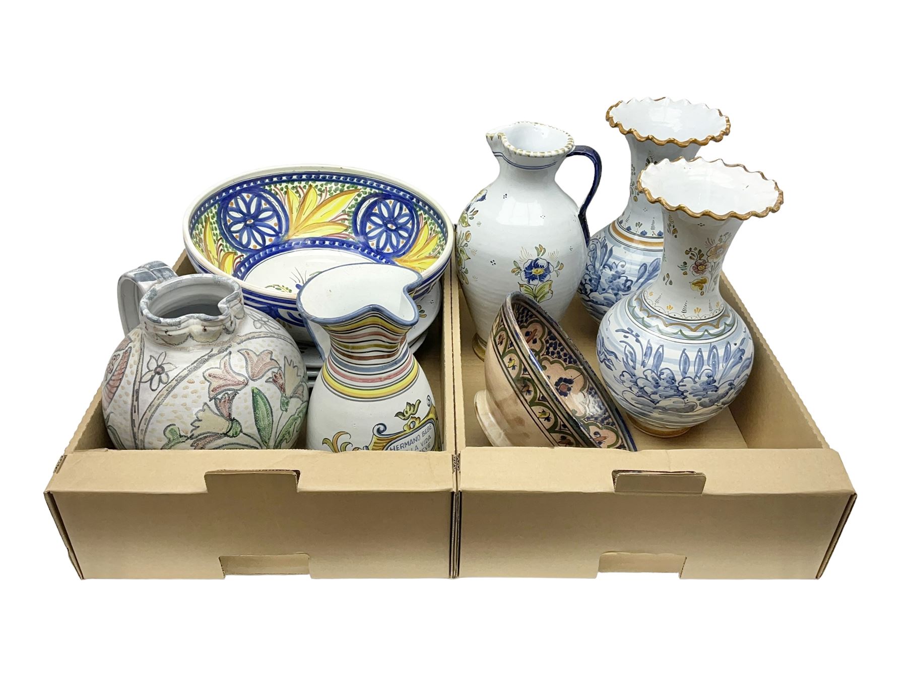 Collection of continental ceramics including jugs, chargers and vases 