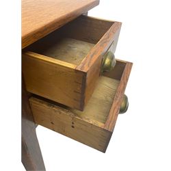 Early 20th century oak clerks desk, fitted with drop centre and drawers, on square supports