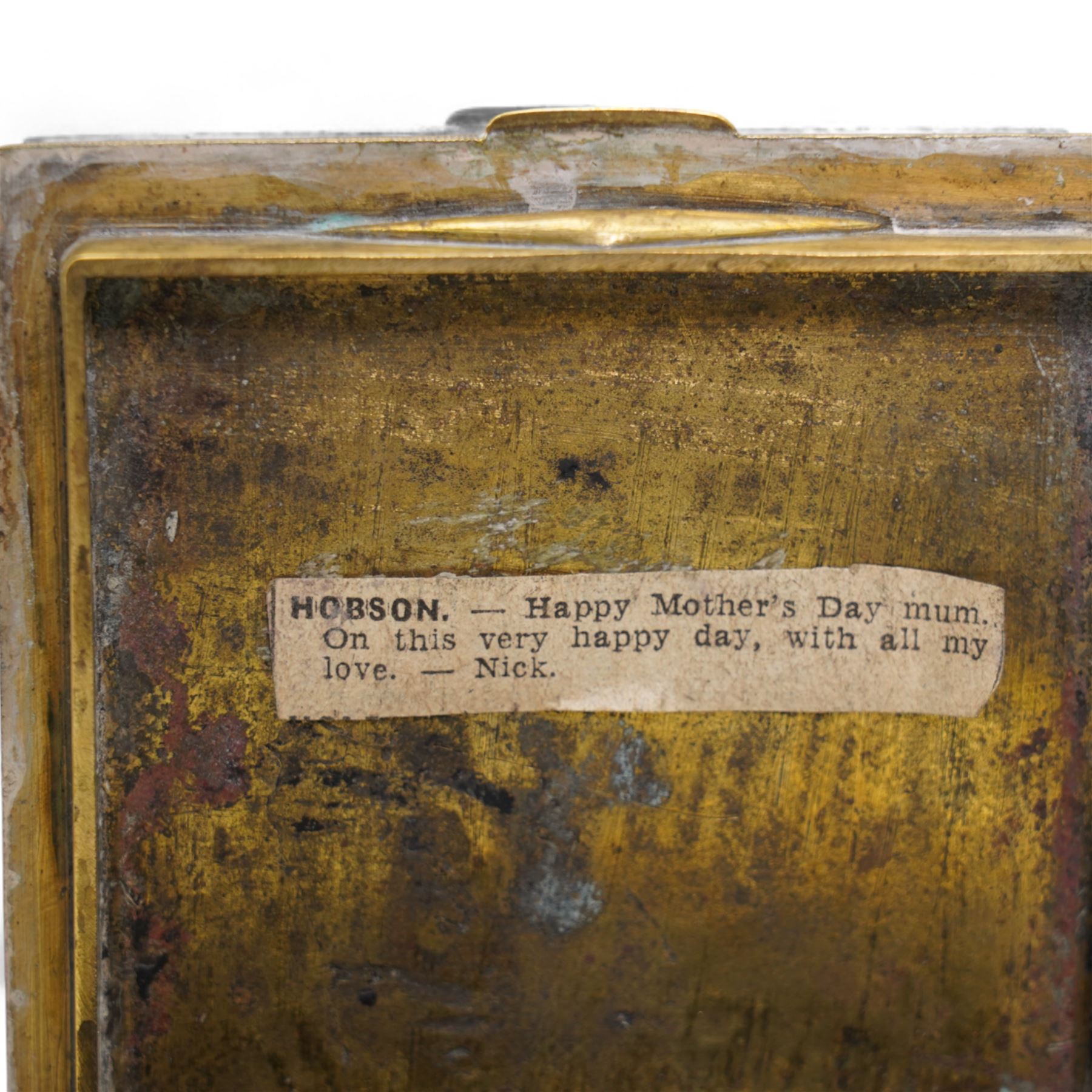 Pair of silver cylindrical dressing table boxes and covers embossed with trailing foliage H7cm, silver upright table photograph frame Birmingham 1909, Indian white metal and glass paperweight and a silver on copper trinket box