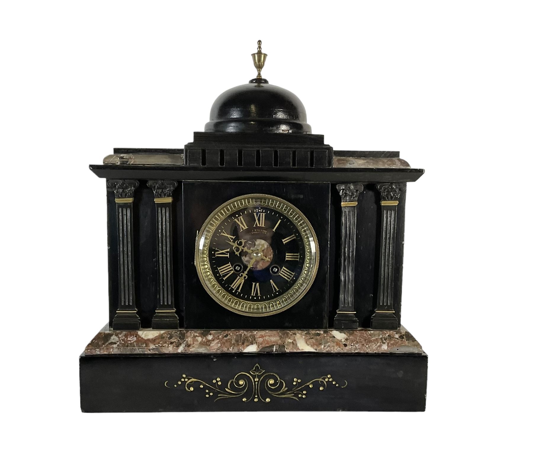 J.W. Benson of London -  8-day Belgium slate mantle clock c1880, stepped top with a central dome and brass finial, break front case with reeded columns and capitals, on a broad plinth with variegated marble and incised gilt decoration, conforming slate dial with contrasting gilt Roman numerals and brass hands, twin train striking movement, striking the hours and half-hours on a bell. With pendulum.