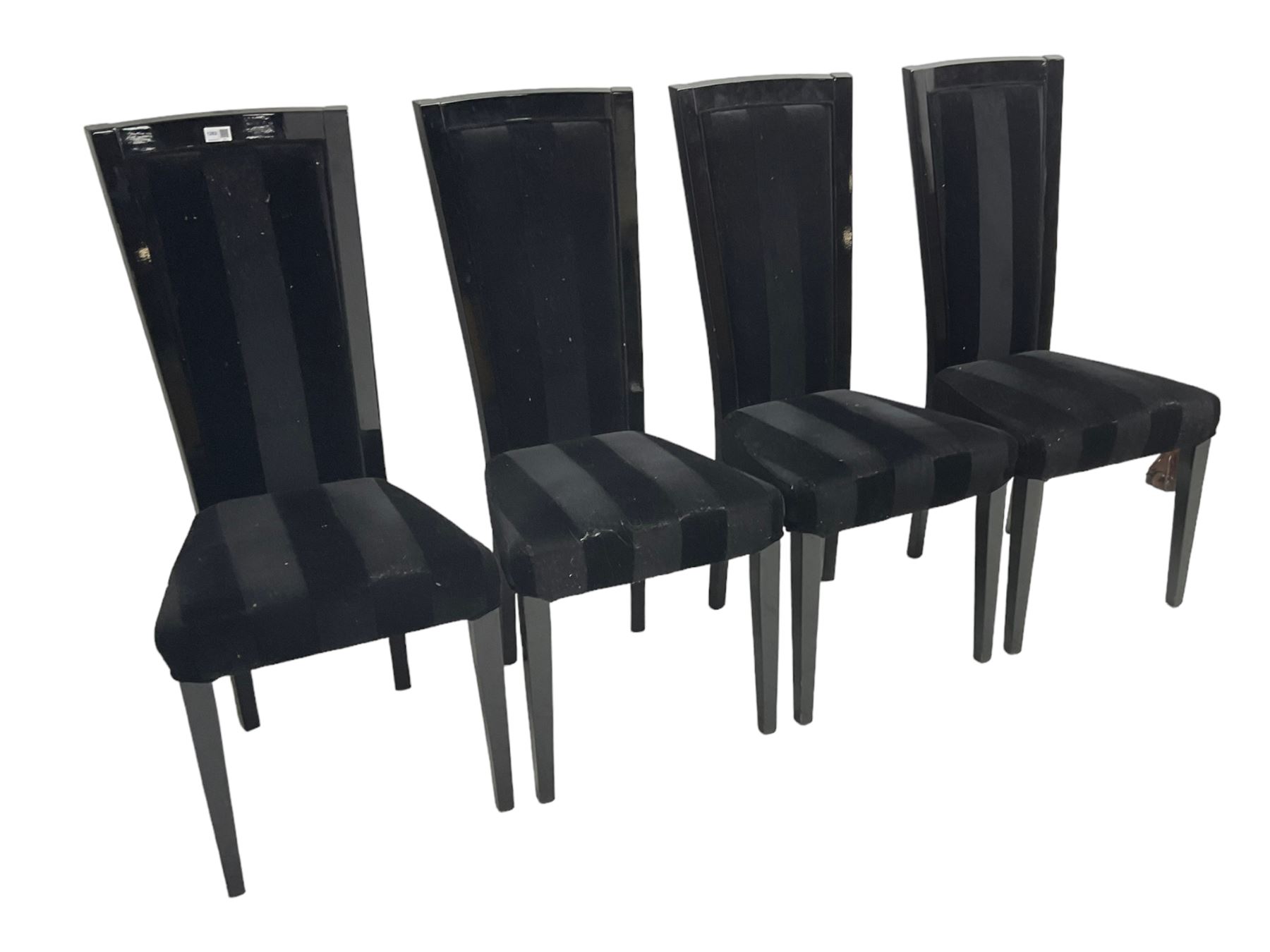 Set of four contemporary ebonised high back dining chairs, upholstered in black velvet fabric