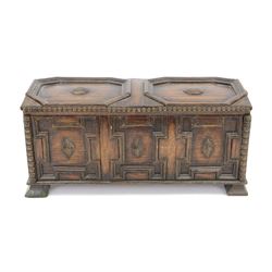 19th century miniature oak coffer, the hinged lid with two octagonal panels and beadwork b...