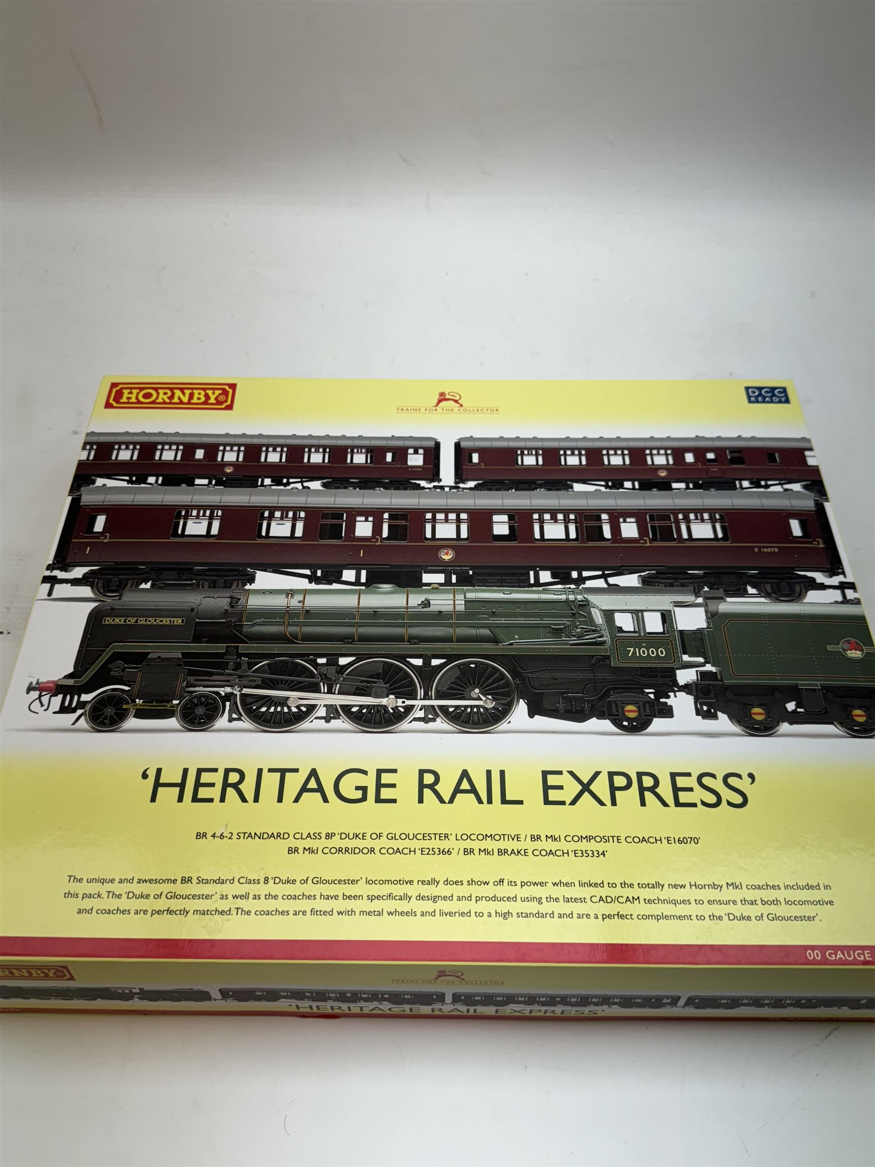 Hornby '00' gauge DCC ready Heritage Rail Express Train Pack R3192, comprising Class 8P 4-6-2 'Duke of Glouscester' locomotive no. 71000 in BR green, MkI Composite Coach no. EI6070, MkI Corridor Coach no. E25366 and MkI Brake Coach no. E35334, in original box