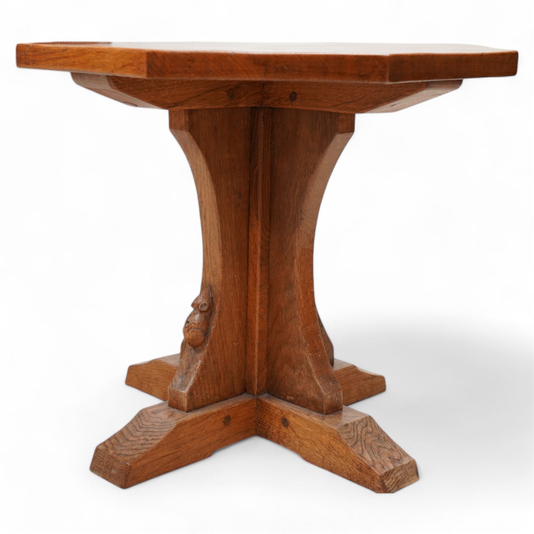 Mouseman - oak coffee table, octagonal adzed top on cruciform base and sledge feet, carved with mouse signature, by the workshop of Robert Thompson, Kilburn  