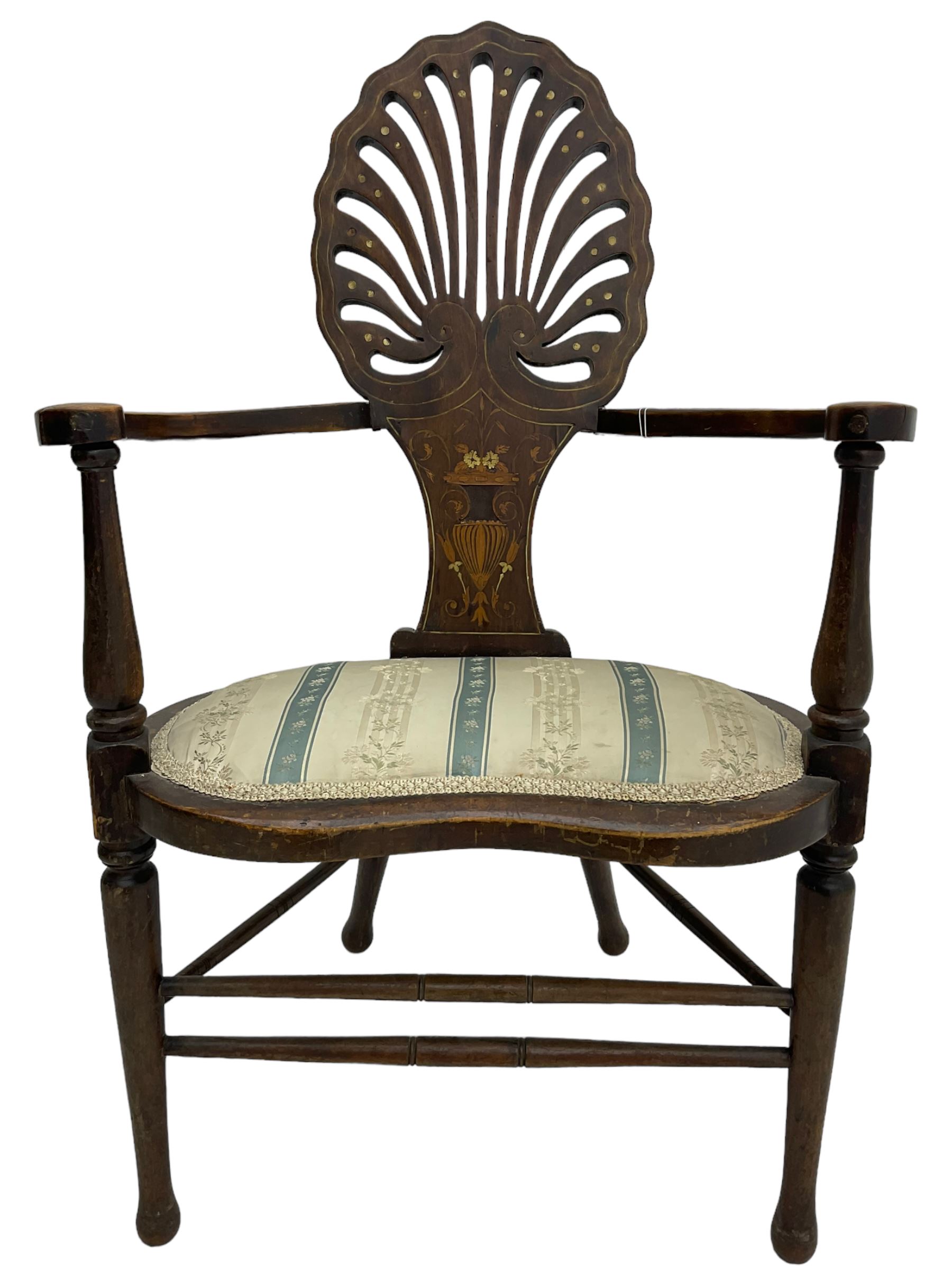 Edwardian mahogany framed chair, pierced shell back inlaid with scrolled stringing, curved arms with scrolled terminals over kidney-shaped upholstered seat, on turned supports united by swell turned stretchers 