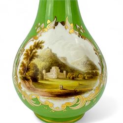 19th century bottle vase and associated cover, the body hand painted with a view of Inveraray Castle, against a green ground, H24cm, pair of green ground spill vases, with floral encrusted banding, H10cm, together with a pair of green ground candlesticks, probably Coalport (5)