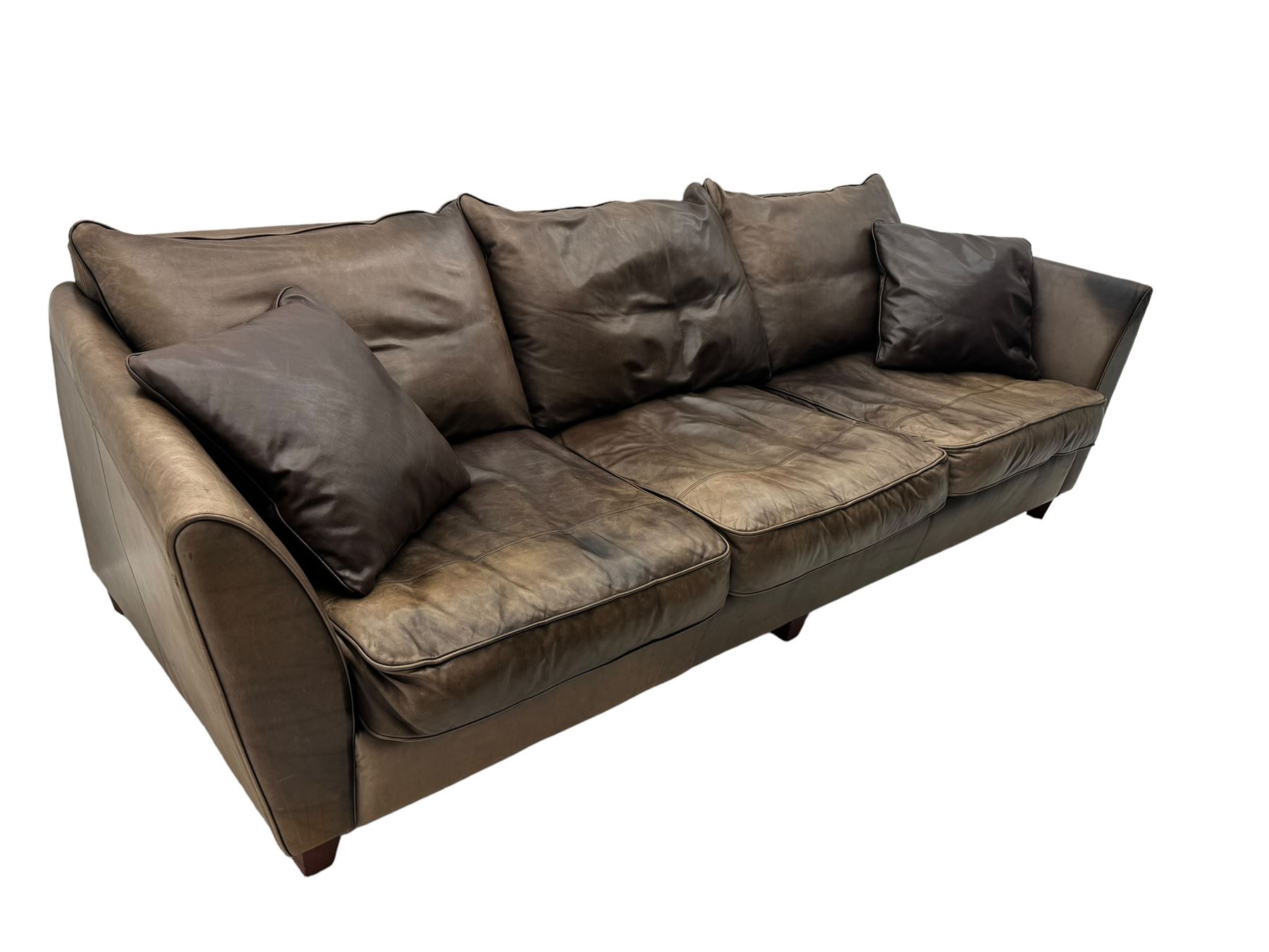 Collins & Hayes - contemporary grande three-seater sofa upholstered in brown leather, with curved arms and standing on tapering feet