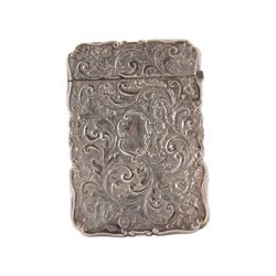 Victorian silver castle-top card case, of rectangular form with scrolling sides, relief embossed with the St Paul's Cathedral and surrounded by foliate scrolls, with vacant cartouche to reverse, hallmarked Nathaniel Mills, Birmingham, probably 1847, H8.5cm W6cm
