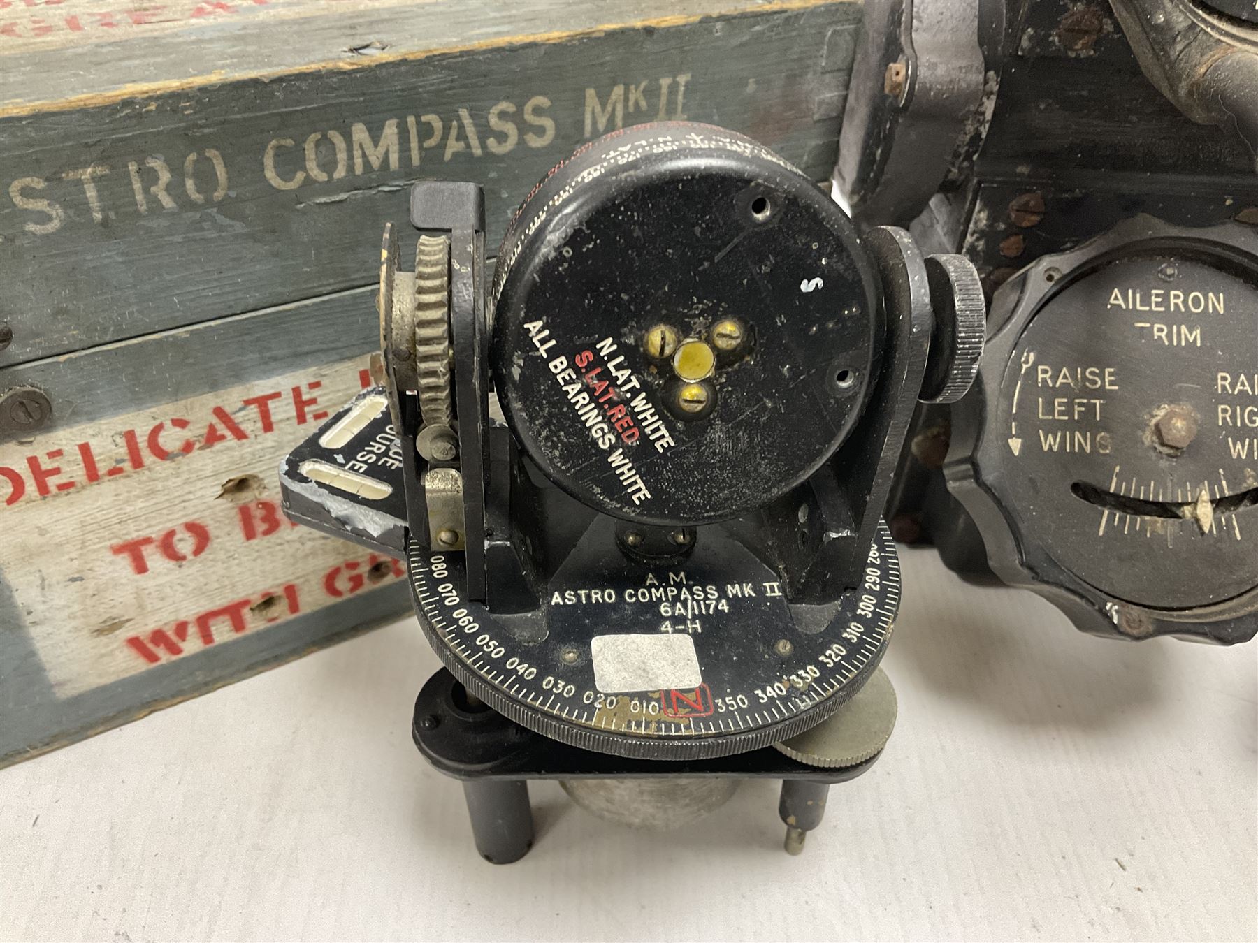 Cased Astro compass mark MK11, together with another and other aircraft equipment marked Aero Controls Ltd 