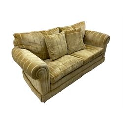 Duresta England - two-seat sofa, upholstered in pale gold fabric, traditional shape with rolled arms