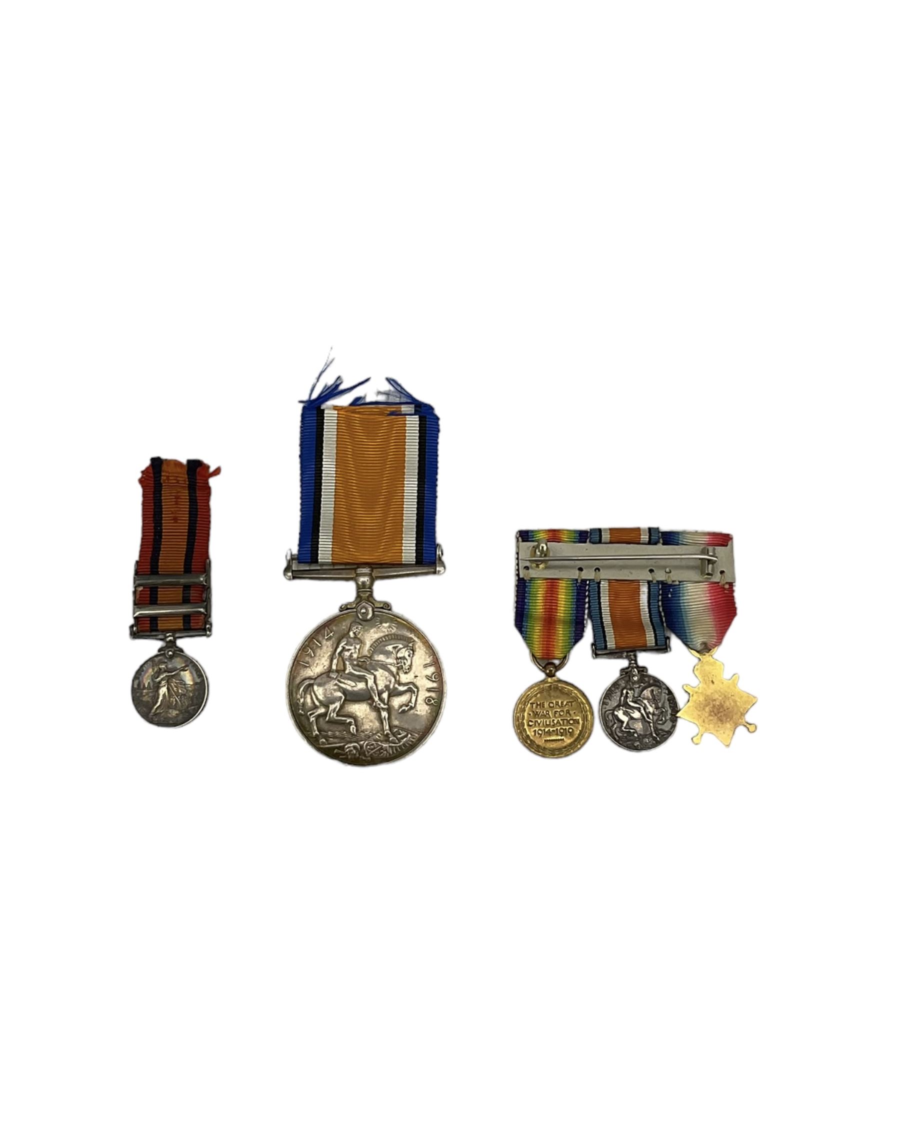 Queen's South Africa miniature medal with Transvaal and Natal clasps, WWI miniature trio and a British War medal to 2071 T.S. J Bowie Engn R.N.R. (3)