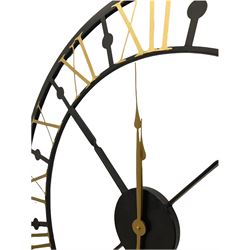 Black and gold painted metal skeleton wall clock
