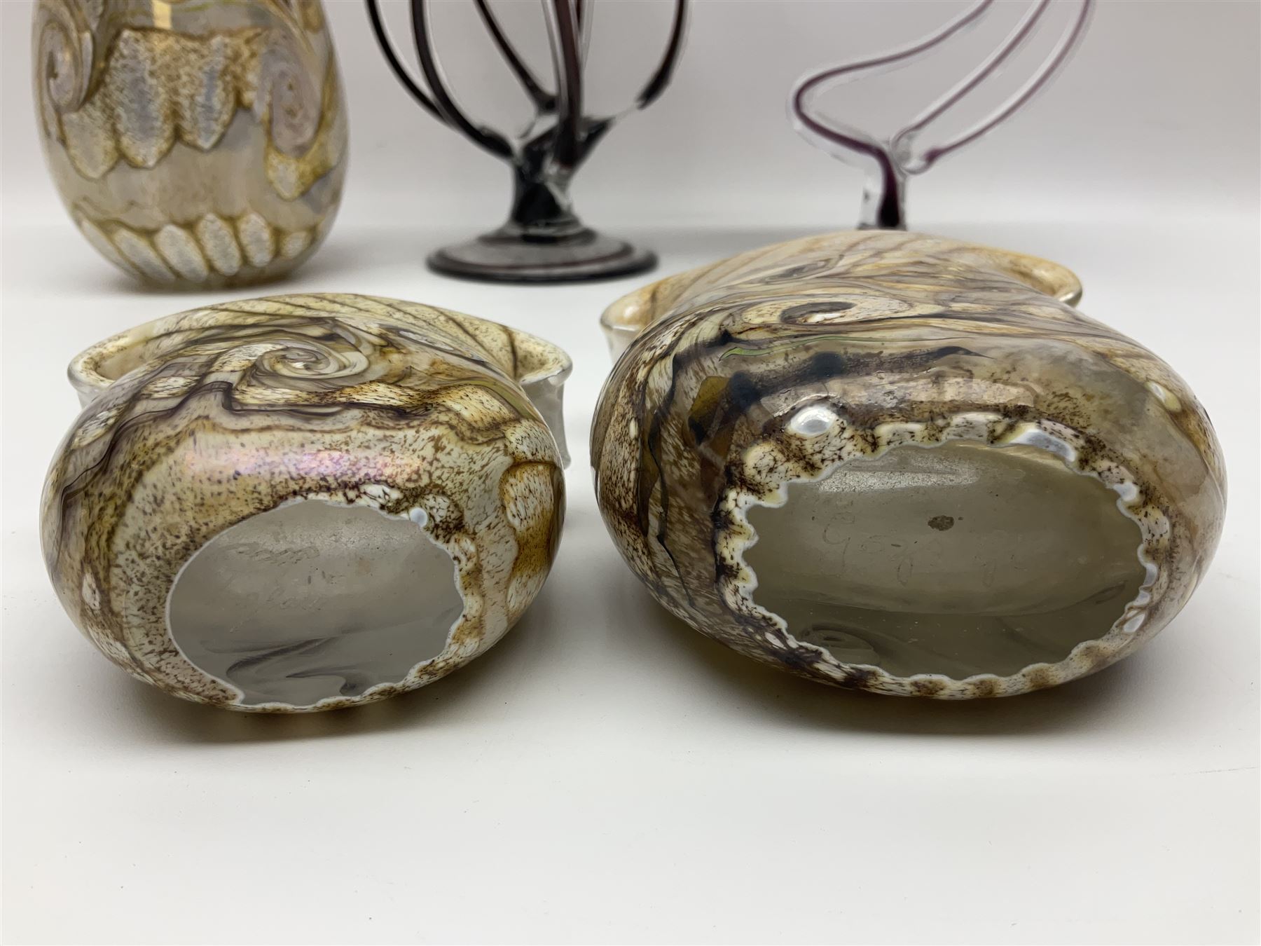 Three Gozo Glass vases of various shapes, decorated with mottled and swirled textured designs in shades of brown, together with two murano  pedestal dishes, largest dish H23cm