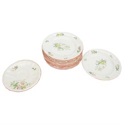 Keller & Guerin Luneville French part tea and dinner service,painted with floral sprays and scattered sprigs within pink edged rims, including covered dish, two meat platters, three coffee pots etc 