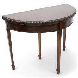 20th century mahogany demi-lune card table, fold-over top with gadrooned edge revealing baize playing surface, single pull-out rear support, on square tapering supports with spade feet