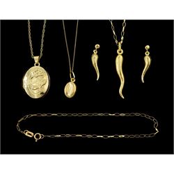 Three gold necklaces including coffee bean, locket and cornicello, pair of matching stud earrings and a gold bracelet, all 9ct