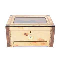 Cigar humidor, of high gloss birdseye maple veneer, the lid with central glass panel, bras...