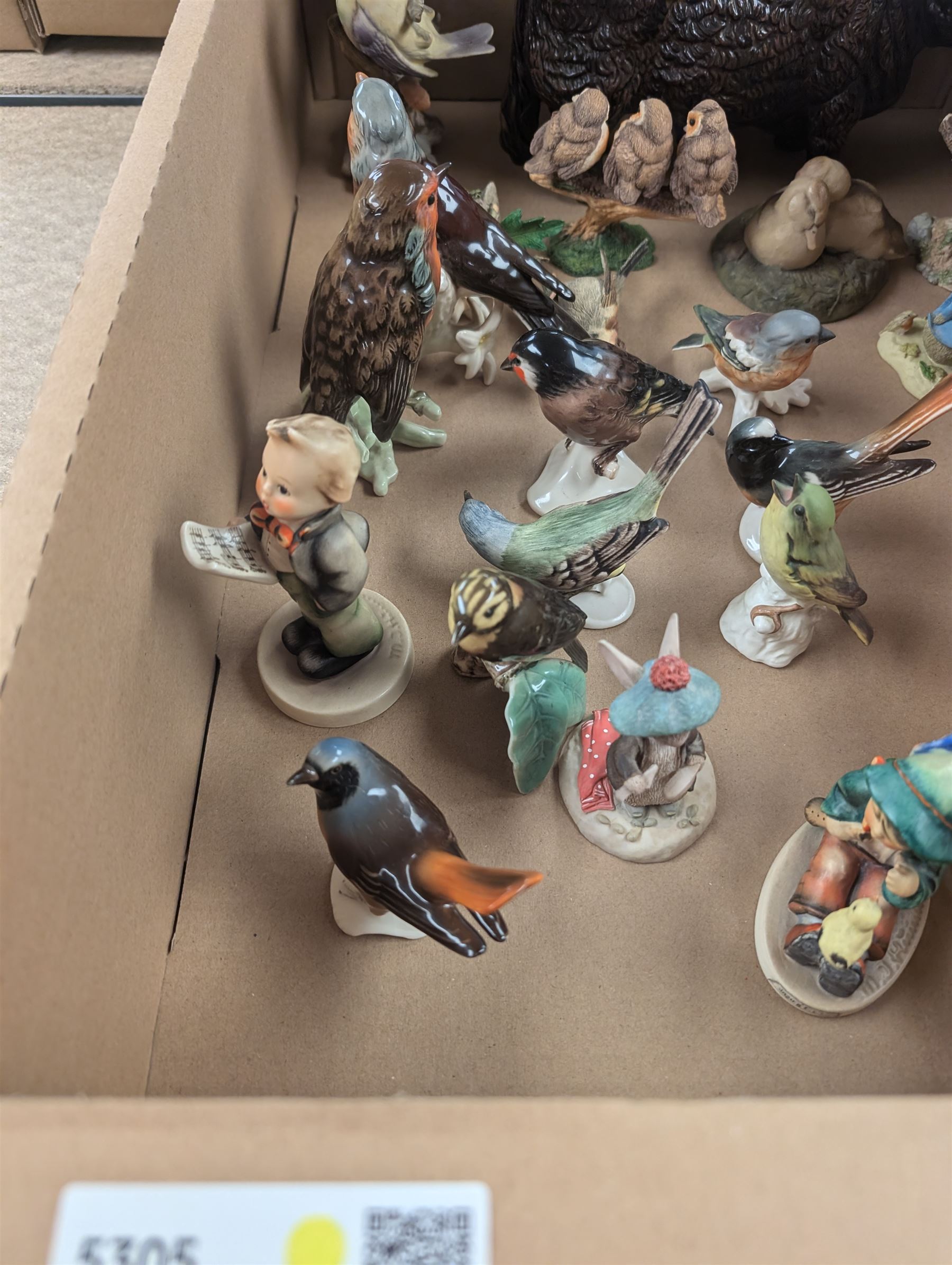 Collection of bird and animal figurines, including Goebel and Country Artists examples