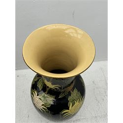 Floor vase with stylised flowers on a black ground, H84cm