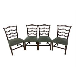 Set of twelve (10+2) Chippendale revival stained beech dining chairs, pierced waived ladder backs with over-stuffed over seats, on square moulded supports joined by stretchers