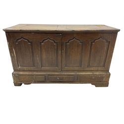 Georgian oak converted mule chest, rectangular plank top over two cupboards with arched Gothic motif panels enclosing storage area with shelves, the base with three drawers with pull handles, on shaped bracket feet