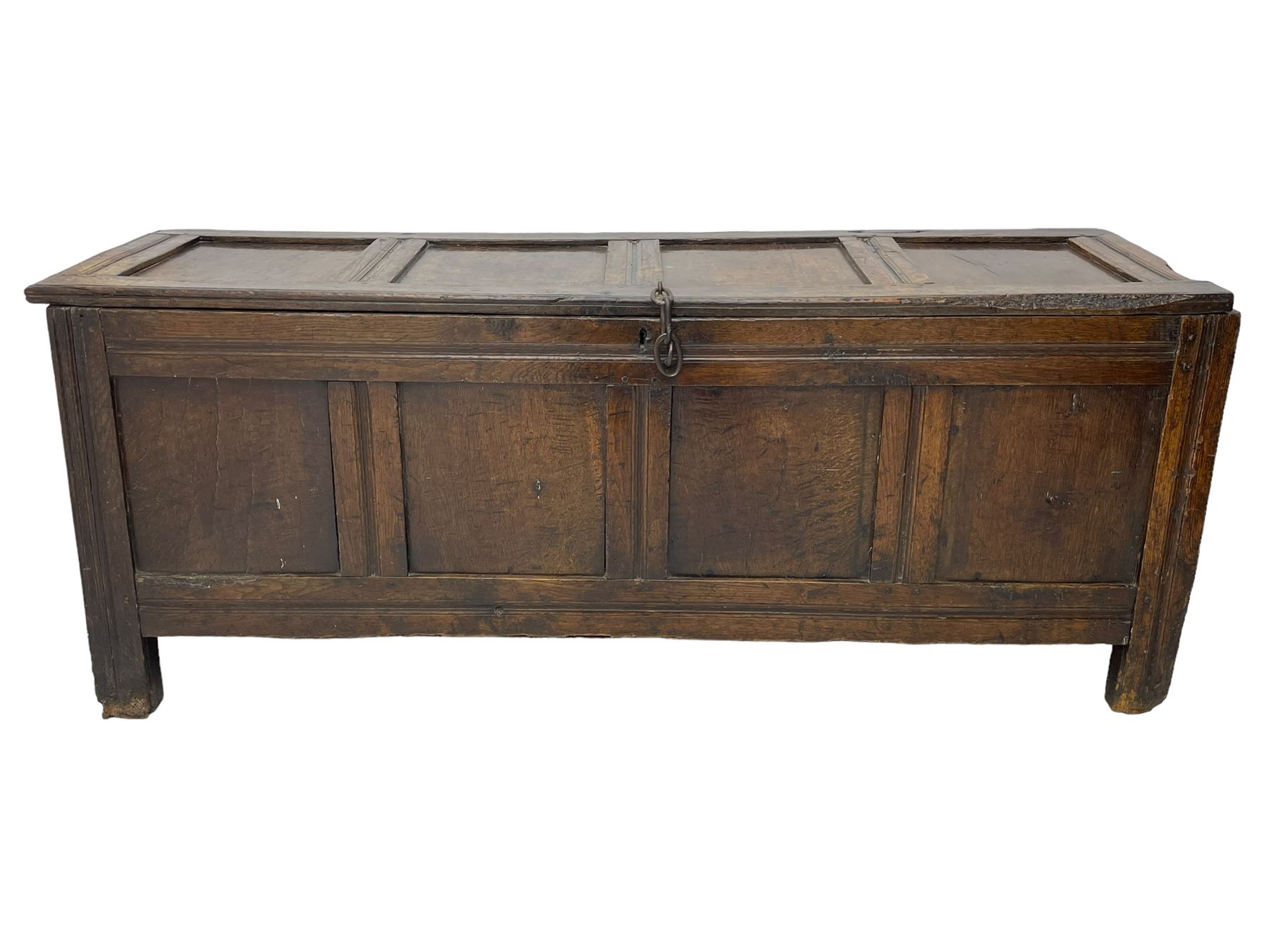 17th century panelled oak blanket chest or kist, quadruple panelled hinged lid over quadruple panelled front, moulded frame and pegged construction, on stile supports